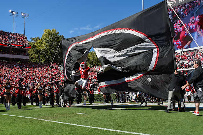 D'Andre Swift jumps out of the banner against South Carolina.